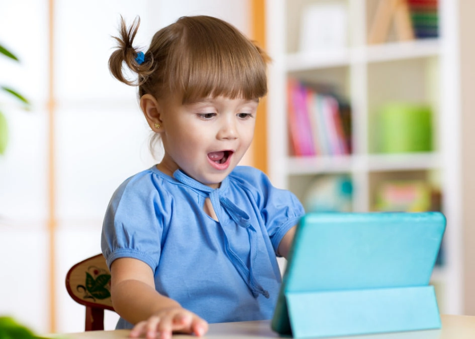 little girl with the tablet